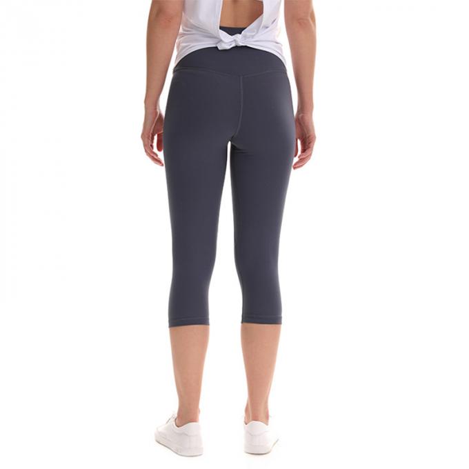 Kundenspezifische nahtlose Gamaschen-Hüften-Eignungs-Yoga-Gamaschen-Frauen-elastische geerntete Hosen-Sport-Hosen, die Ausbildungsstrumpfhosen plus Größe laufen lassen